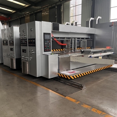 Keunggulan 2 Warna Ink Flexo Printing Slotting Die Cutting Machinery Dengan Stacker Penghapusan Getaran